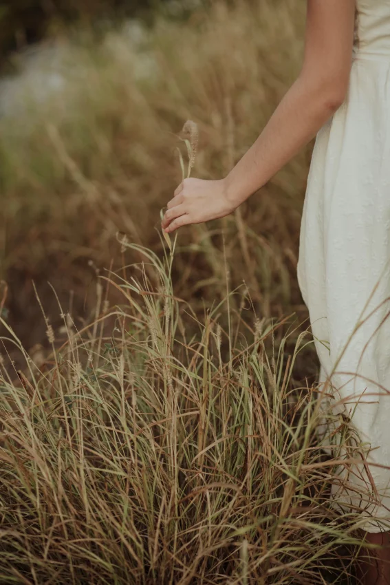 Woman walking through grass | Tanya Dunlop Therapy